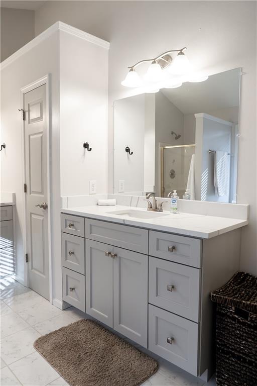 1004 Cavesson Terrace Lawrenceville, GA 30045 - Photo 35 of 48 a bathroom with double vanity sink and a mirror