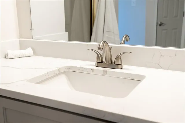 a bathroom with a sink and a bathtub