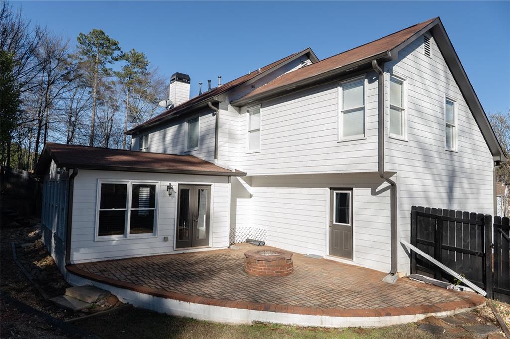 1004 Cavesson Terrace Lawrenceville, GA 30045 - Photo 40 of 48 a front view of a house with garden