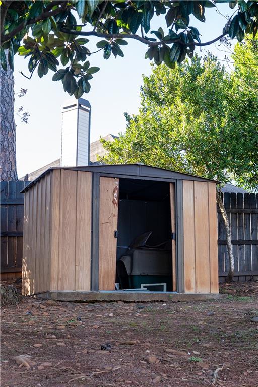 1004 Cavesson Terrace Lawrenceville, GA 30045 - Photo 43 of 48 a backyard of a house with lots of green space