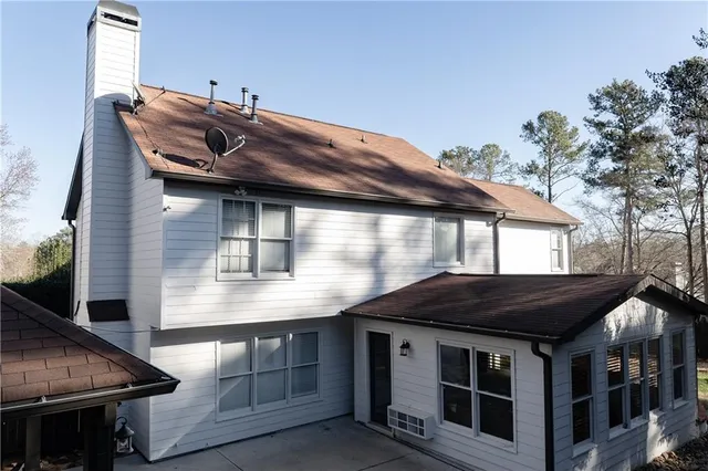 a front view of a house with a garage