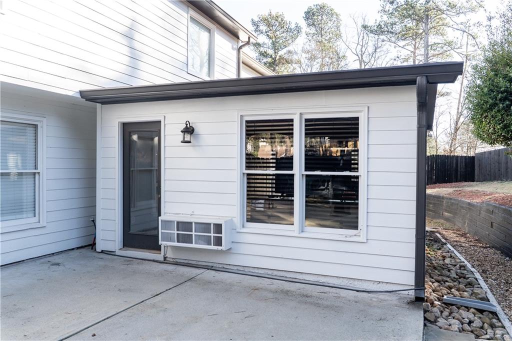 1004 Cavesson Terrace Lawrenceville, GA 30045 - Photo 45 of 48 a front view of a house with a garage