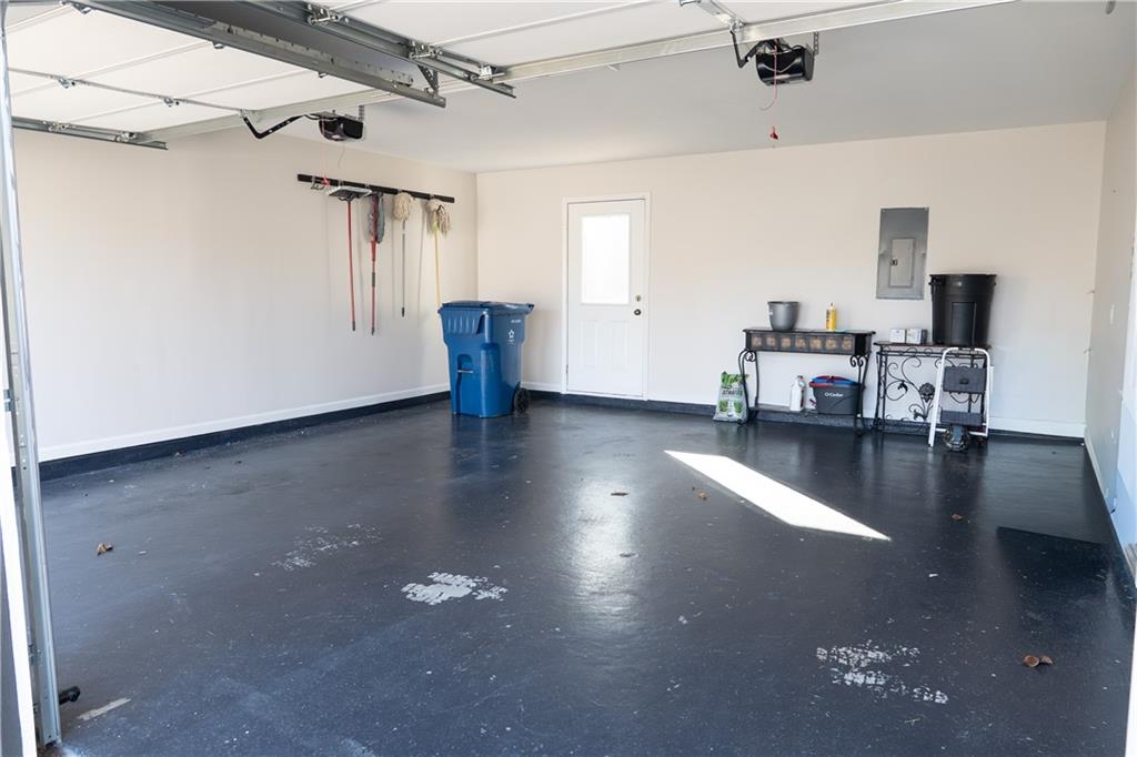 1004 Cavesson Terrace Lawrenceville, GA 30045 - Photo 47 of 48 a view of a livingroom with furniture and a ceiling fan
