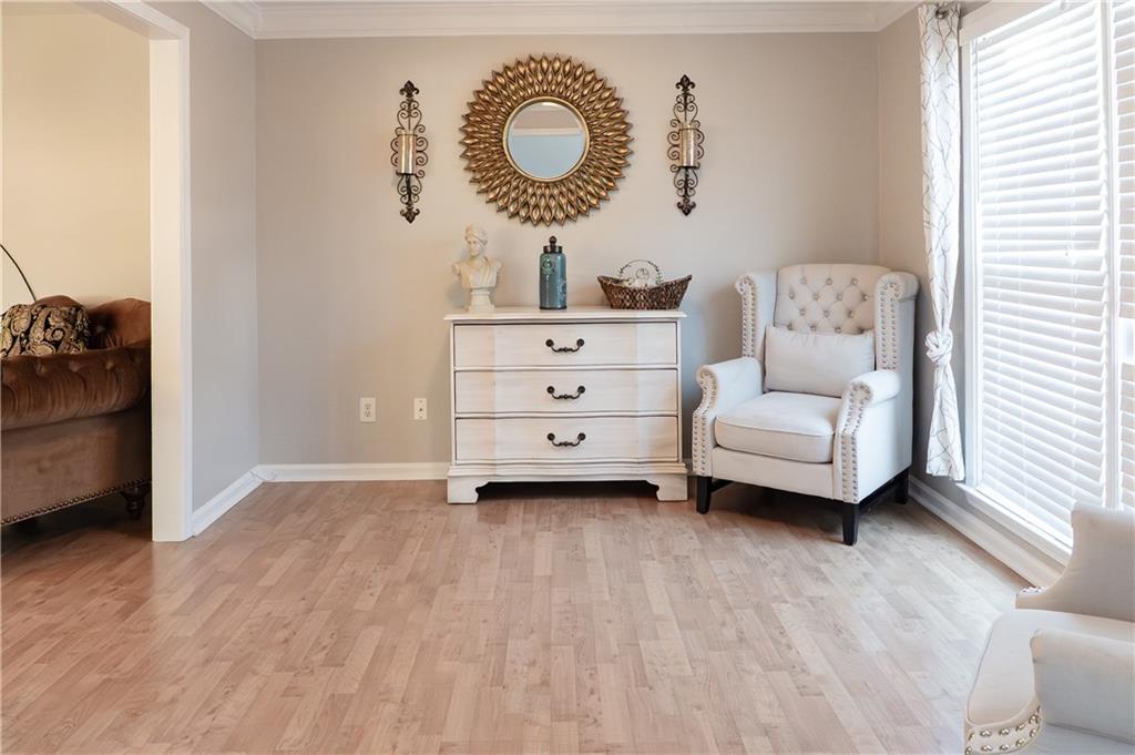 1004 Cavesson Terrace Lawrenceville, GA 30045 - Photo 8 of 48 a living room with furniture and a window