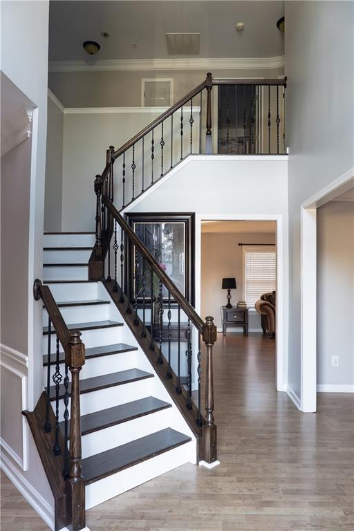 1004 Cavesson Terrace Lawrenceville, GA 30045 - Photo 10 of 48 a view of entryway and hall with wooden floor