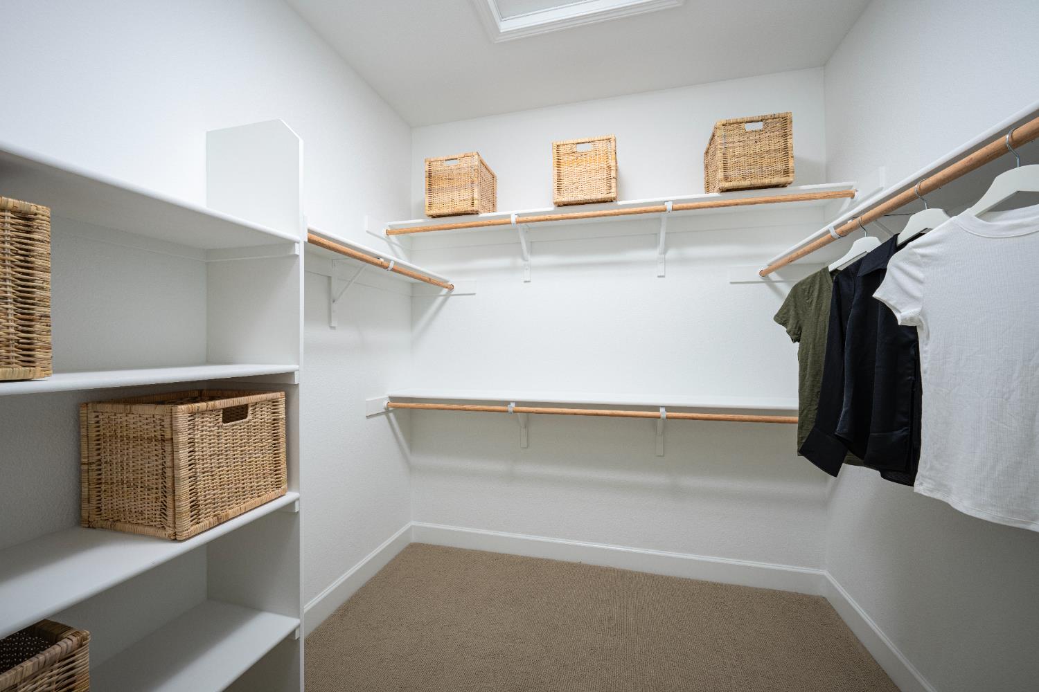 6708 Kaweah Lane Stockton, CA 95219 - Photo 12 of 21 a view of walk in closet with clothes and shoes
