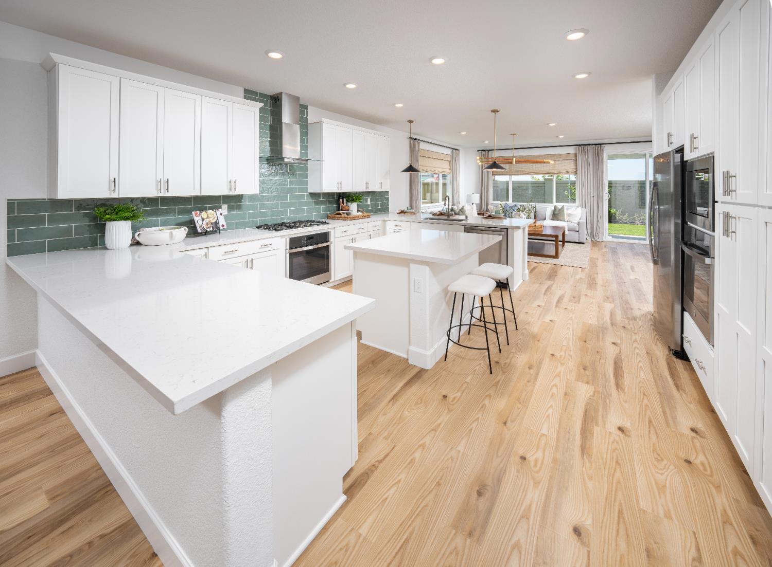 6708 Kaweah Lane Stockton, CA 95219 - Photo 2 of 21 a kitchen with a sink a counter top space stainless steel appliances and cabinets