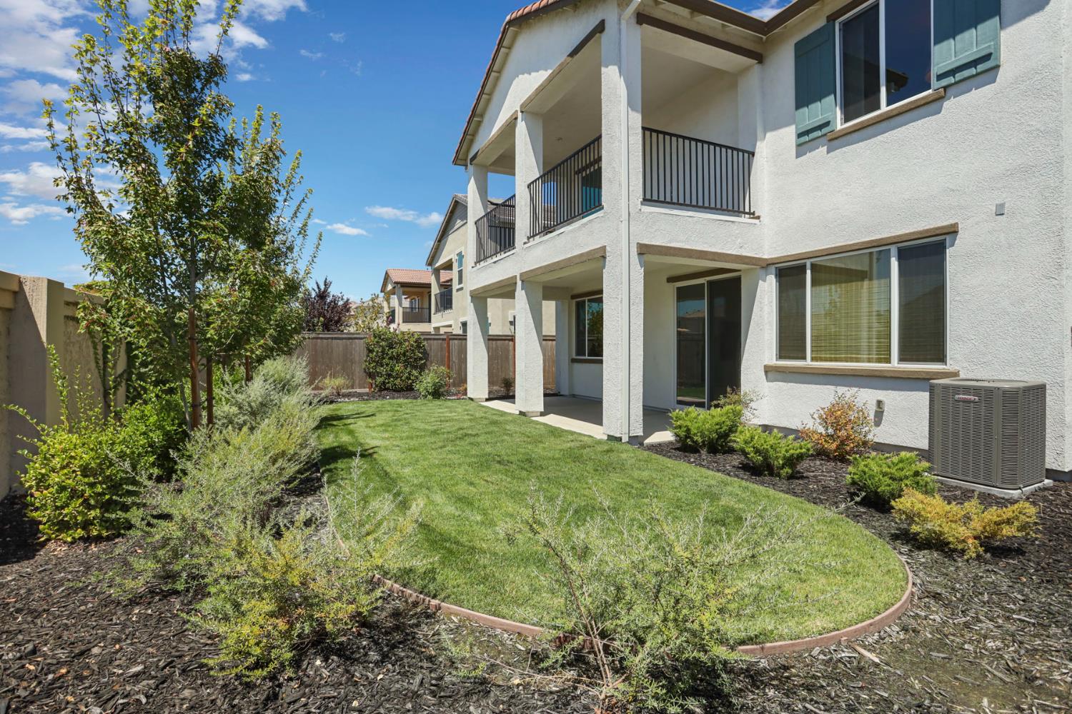 6708 Kaweah Lane Stockton, CA 95219 - Photo 21 of 21 front view of a house with a yard