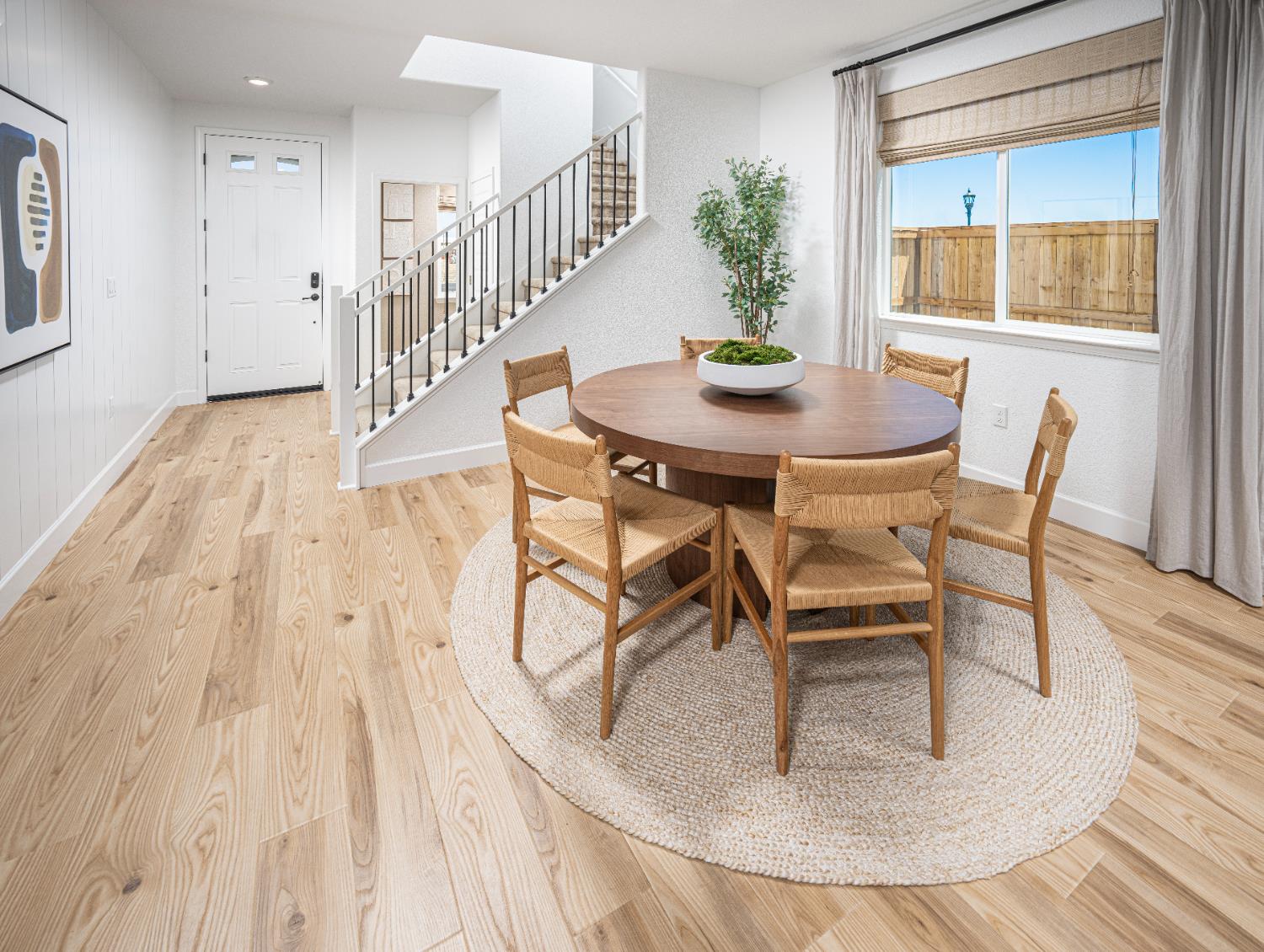 6708 Kaweah Lane Stockton, CA 95219 - Photo 3 of 21 a dining room with wooden floor and breakfast area
