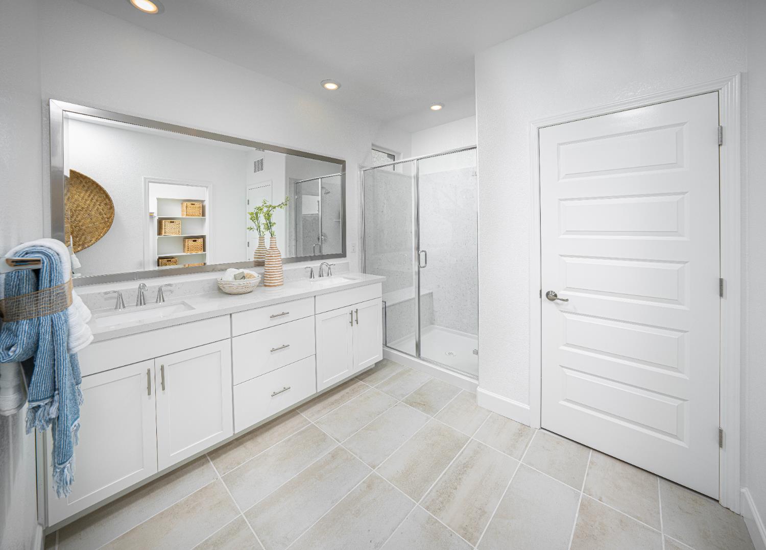 6708 Kaweah Lane Stockton, CA 95219 - Photo 7 of 21 a spacious bathroom with a double vanity sink a mirror and a