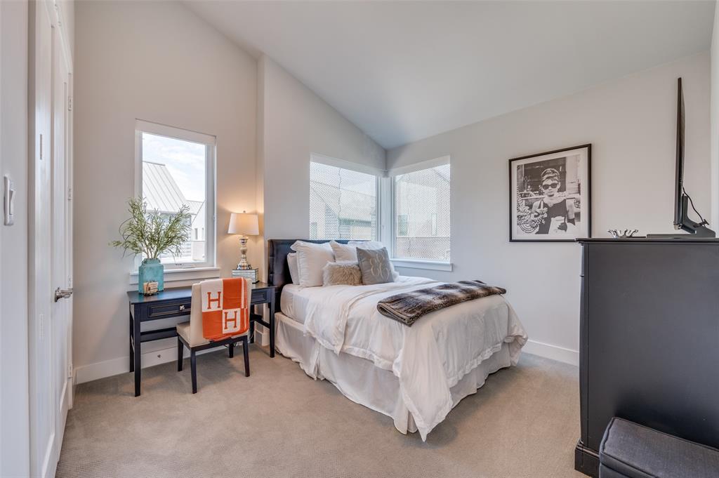 9142 Prado Lane Dallas, TX 75220 - Photo 16 of 21 a bedroom with a bed and a window