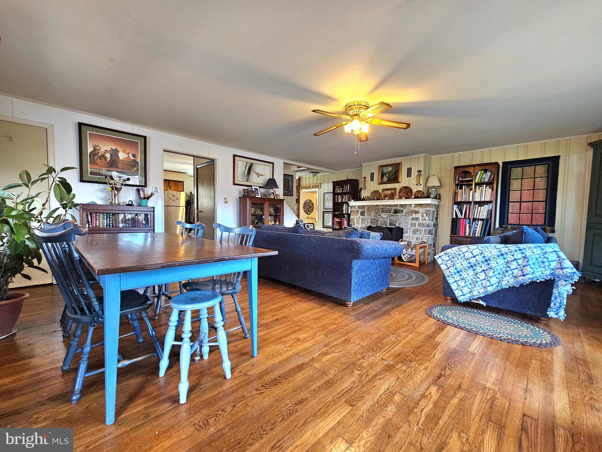 205 Valley View Road Hellertown, PA 18055 - Photo 15 of 27 a living room with fireplace furniture and a wooden floor