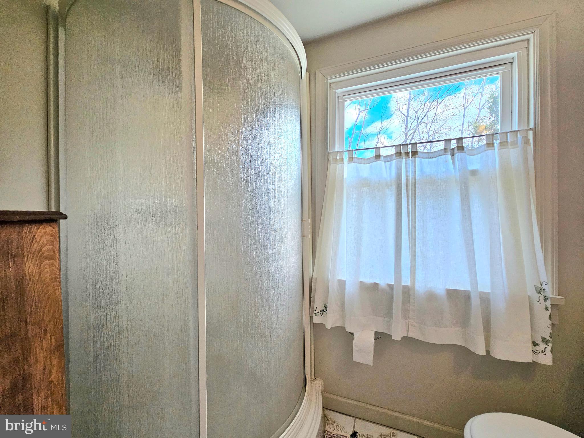 205 Valley View Road Hellertown, PA 18055 - Photo 20 of 27 a bathroom with a sink and a mirror