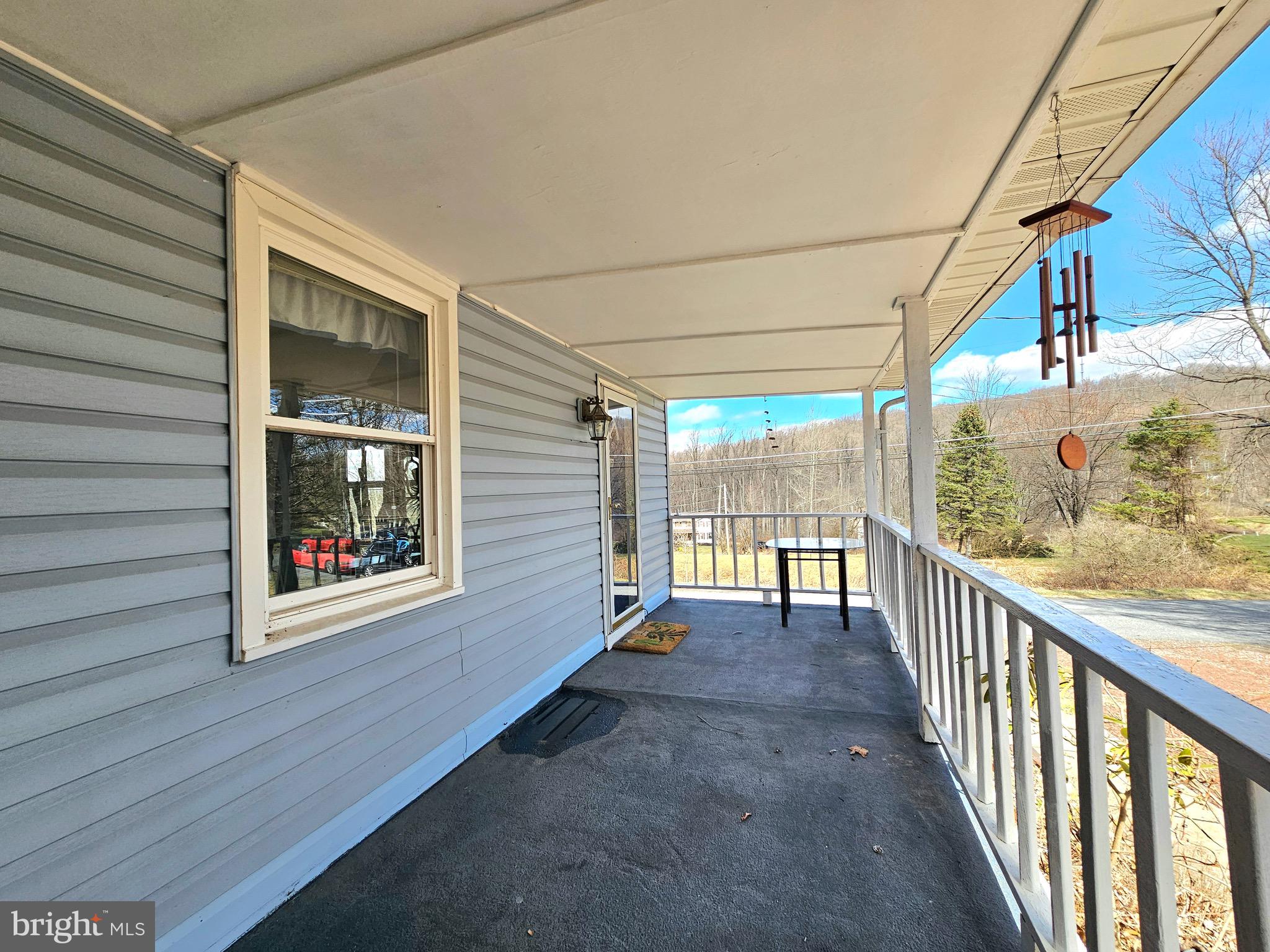 205 Valley View Road Hellertown, PA 18055 - Photo 23 of 27 a view of a porch with wooden floor and outdoor space