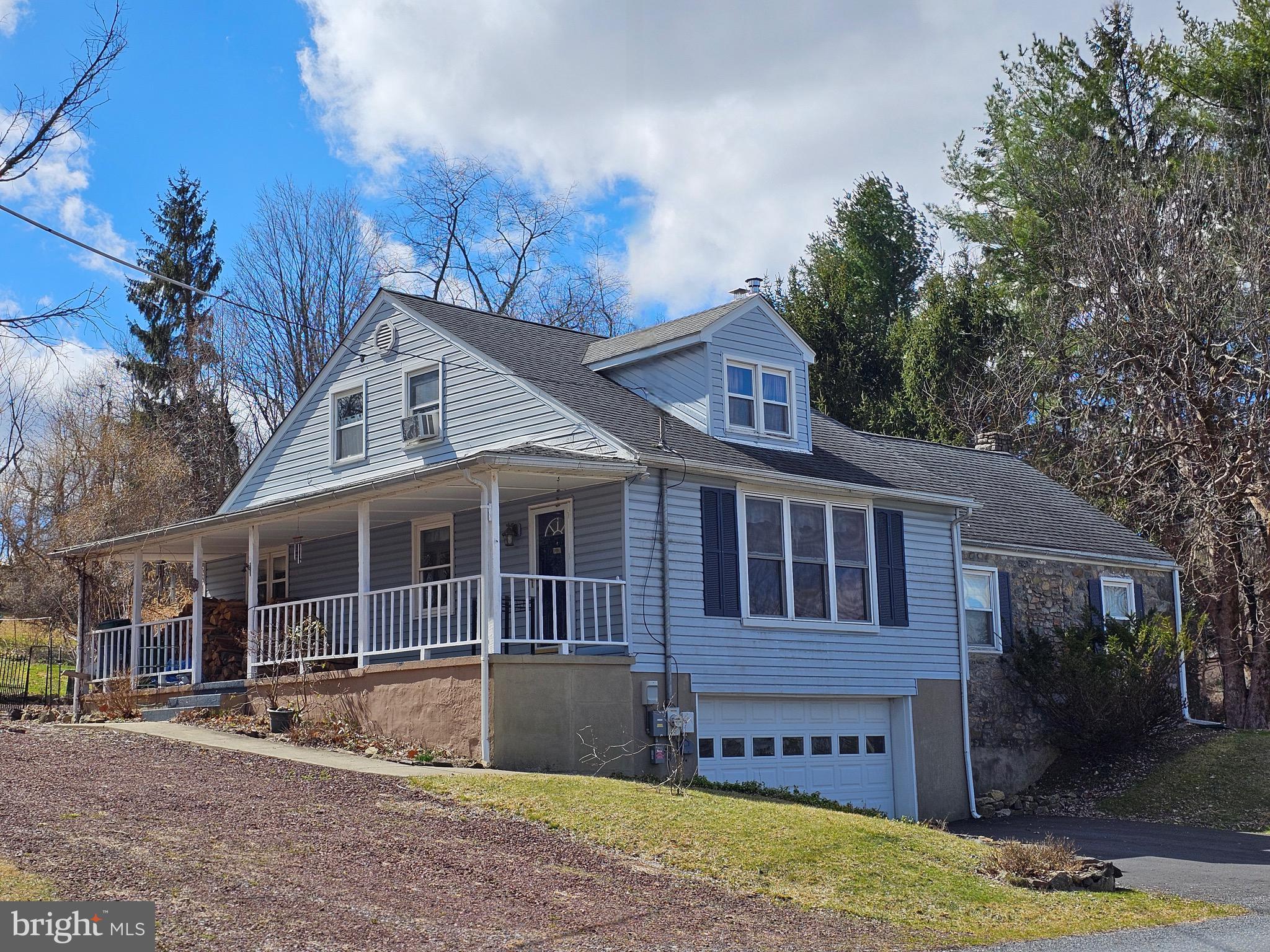 205 Valley View Road Hellertown, PA 18055 - Photo 24 of 27 a view of a house with a yard and sitting area