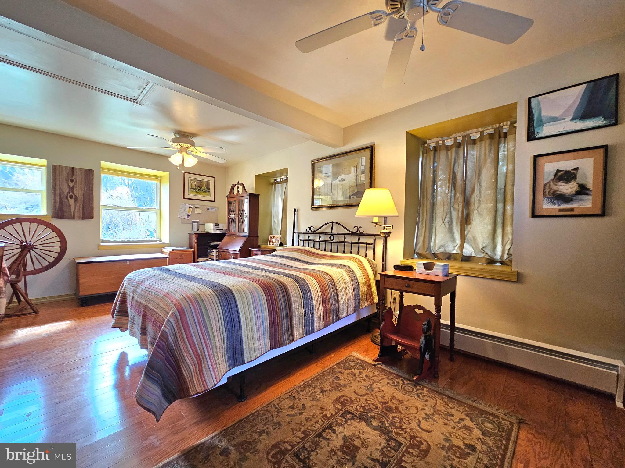 205 Valley View Road Hellertown, PA 18055 - Photo 9 of 27 a bedroom with a bed and wooden floor
