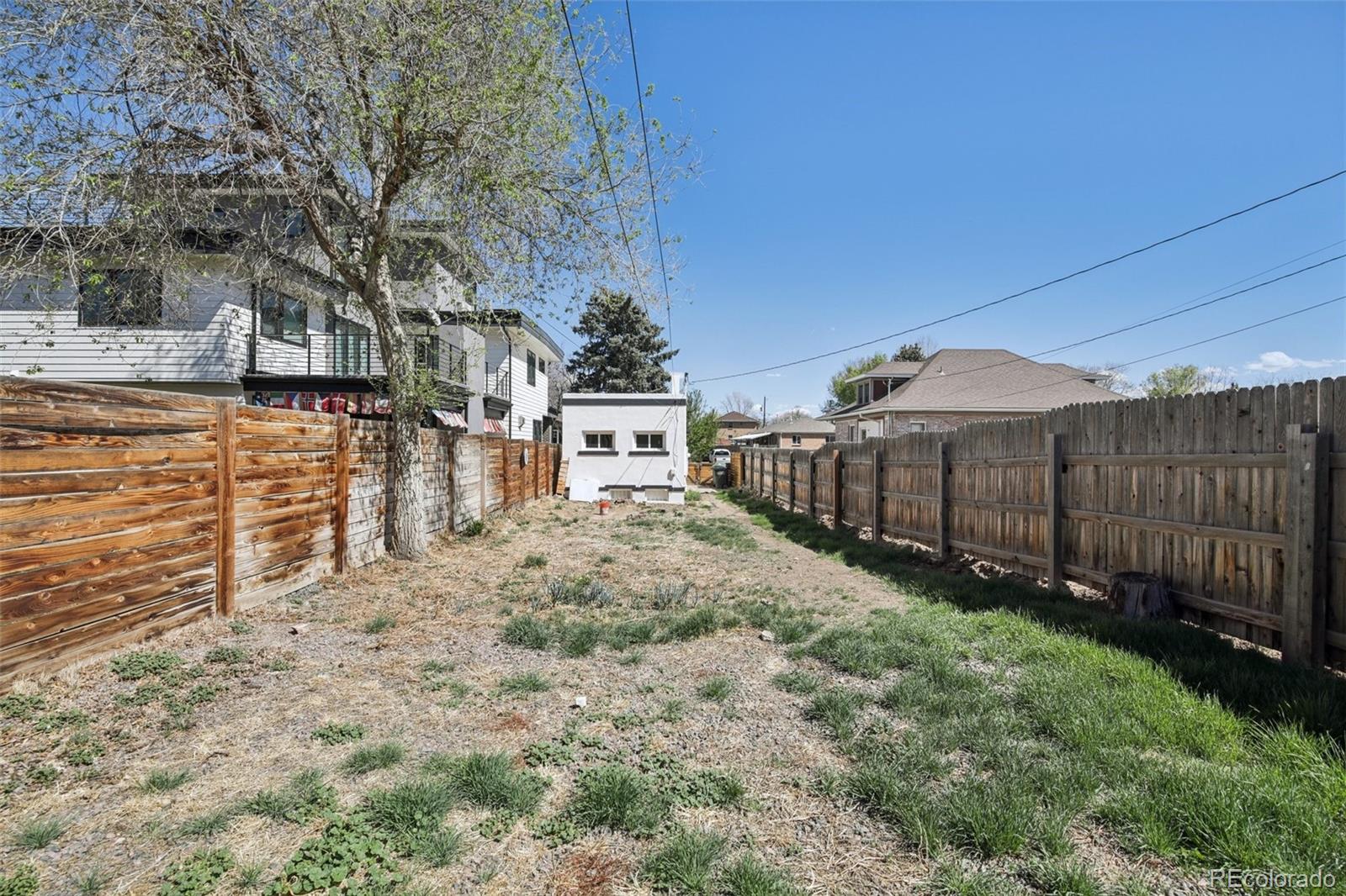 2715 Cook Street Denver, CO 80205 - Photo 27 of 30 a view of street along with trees