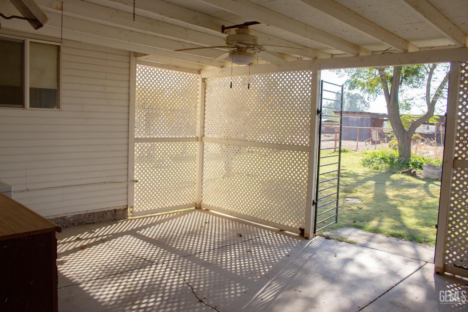 Undisclosed Address Bakersfield, CA 93307 - Photo 23 of 29 a view of a door with a glass door