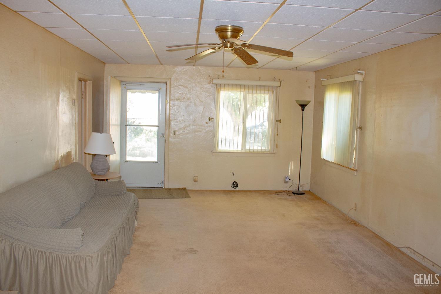 Undisclosed Address Bakersfield, CA 93307 - Photo 3 of 29 a view of an empty room with a window
