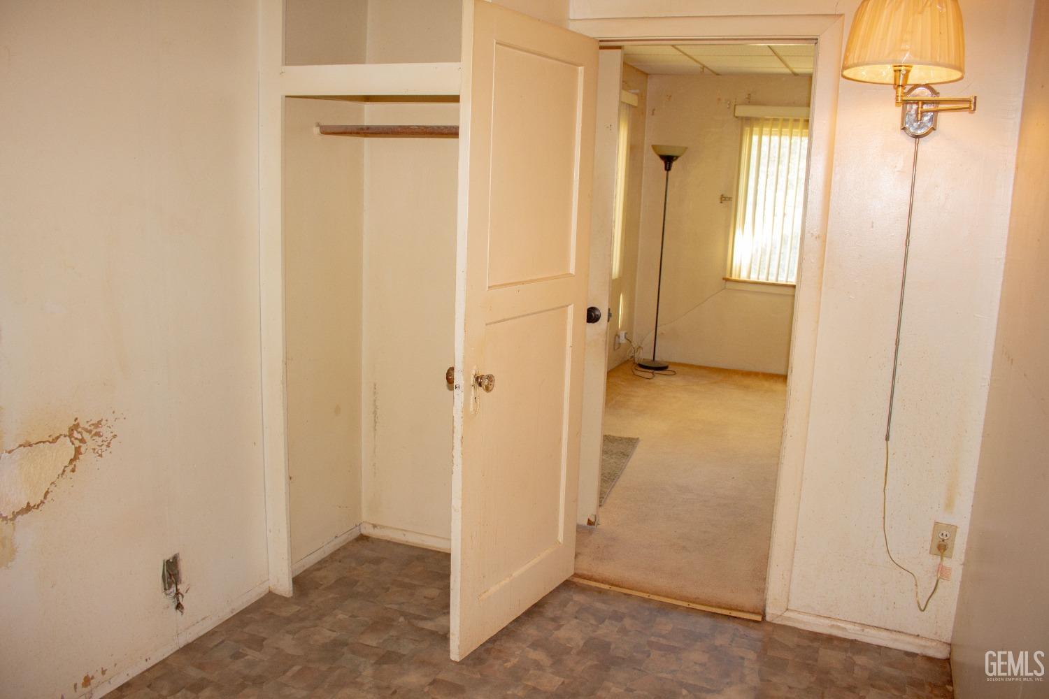 Undisclosed Address Bakersfield, CA 93307 - Photo 8 of 29 a view of a bathroom with a shower
