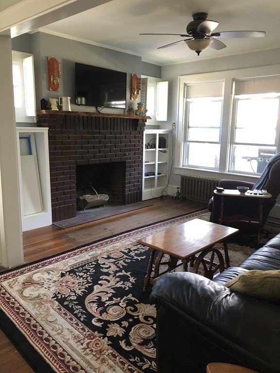 10 Worcester Avenue Montague, MA 01376 - Photo 12 of 35 a living room with a couch and a fireplace