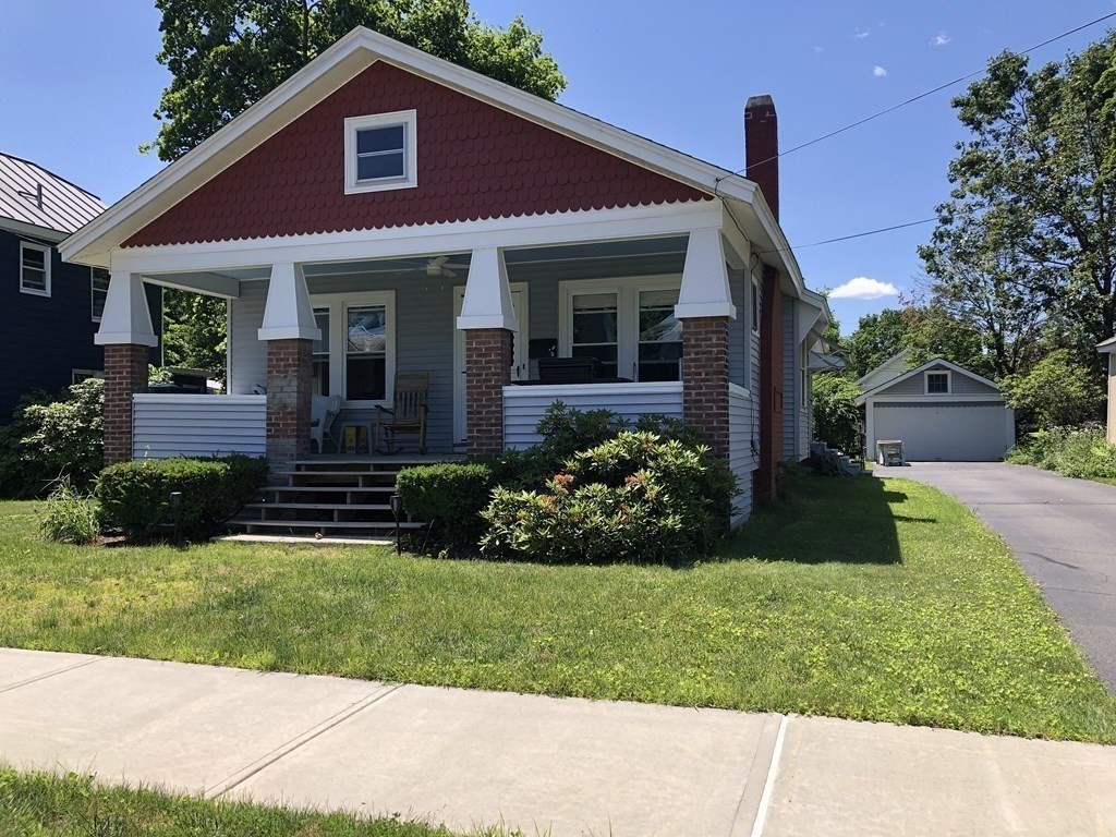10 Worcester Avenue Montague, MA 01376 - Photo 3 of 35 a front view of a house with a garden and plants