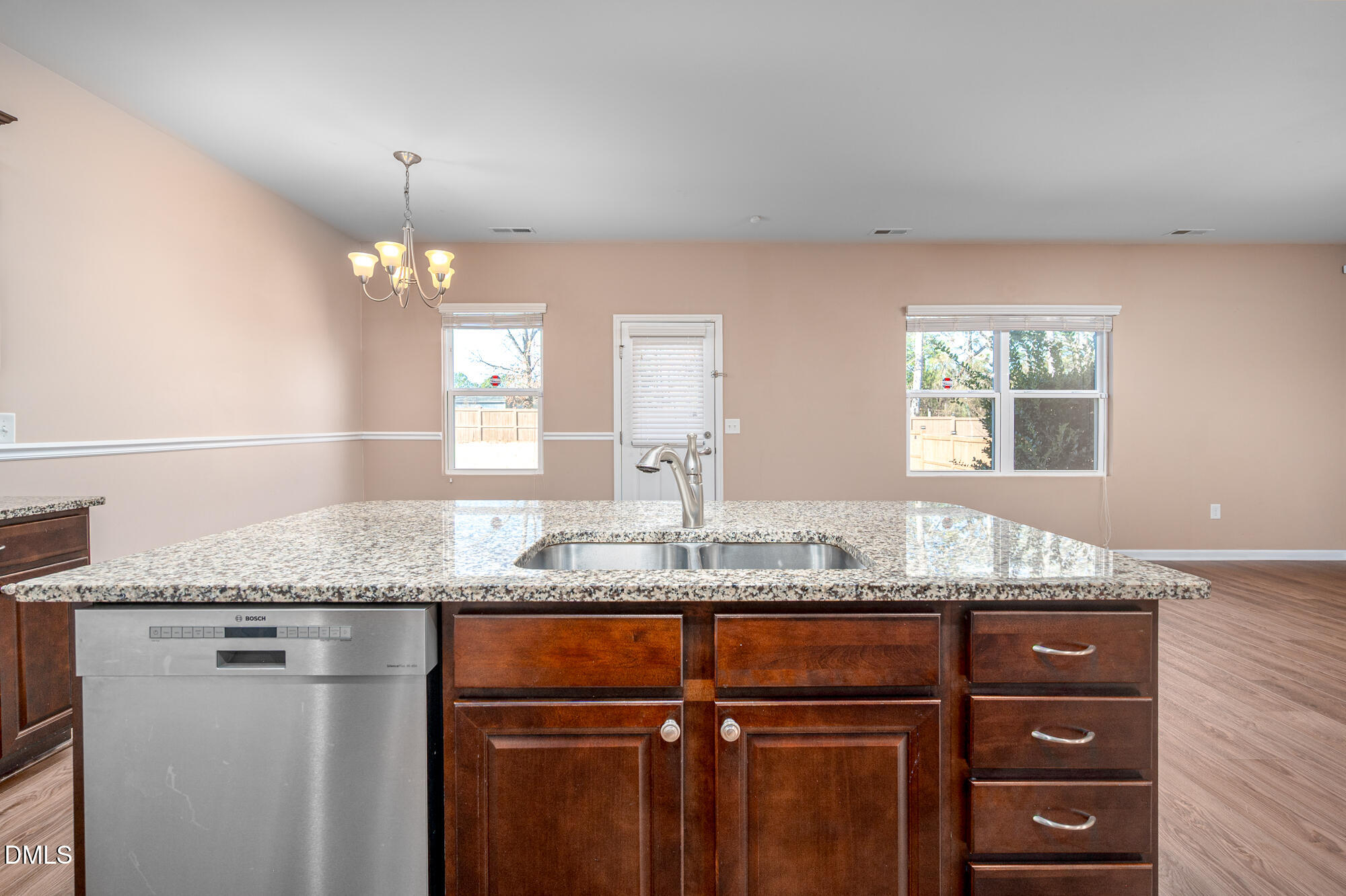 3548 Althorp Drive Raleigh, NC 27616 - Photo 12 of 56 a bathroom with a granite countertop sink and a mirror