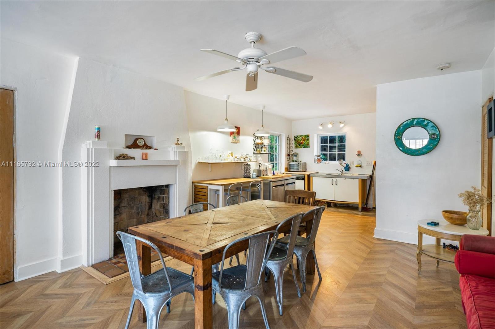 635 Northeast 68th Street Miami, FL 33138 - Photo 2 of 14 a dining room with furniture and window