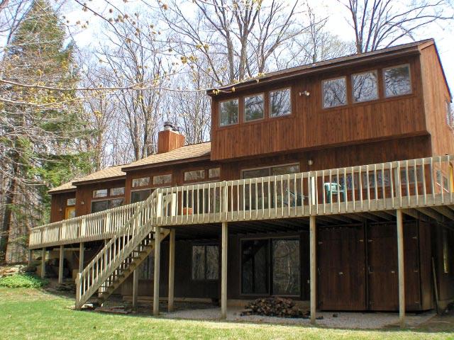 474 Norton Road Otis, MA 01029 - Photo 2 of 16 a view of a house with a yard