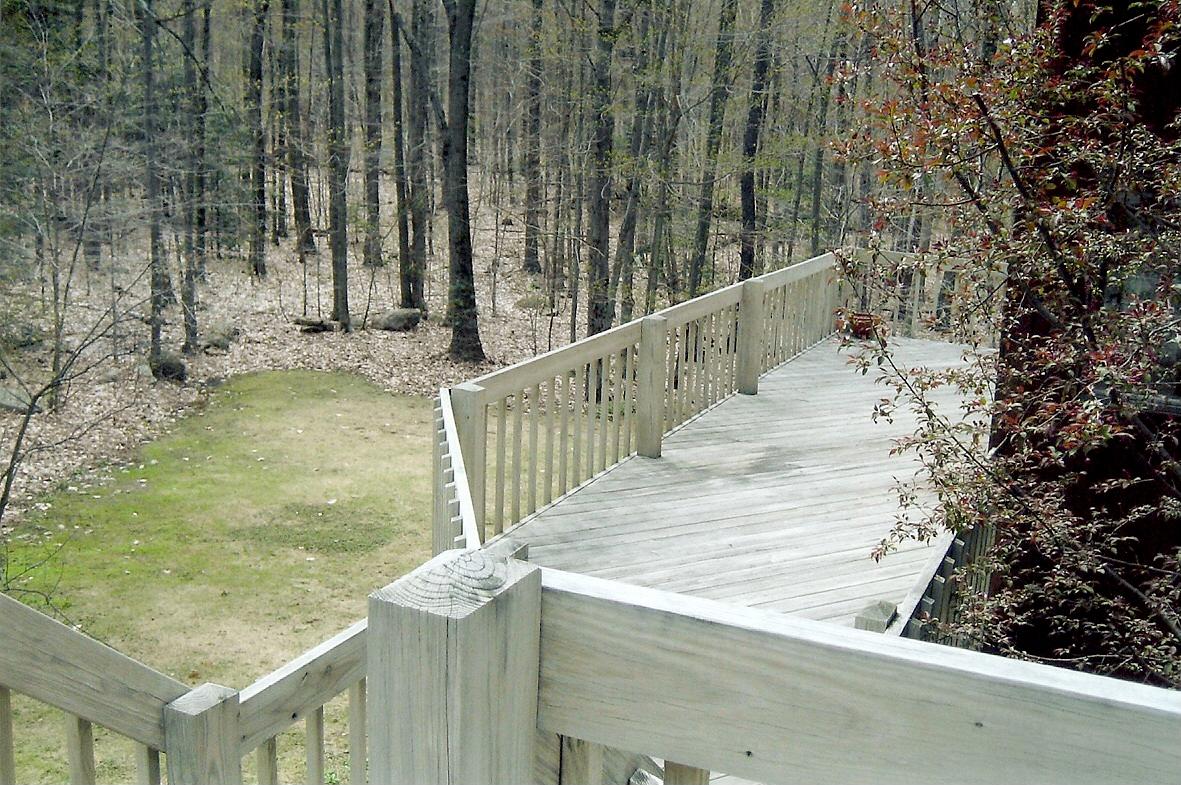 474 Norton Road Otis, MA 01029 - Photo 11 of 16 a view of balcony with wooden floor and fence