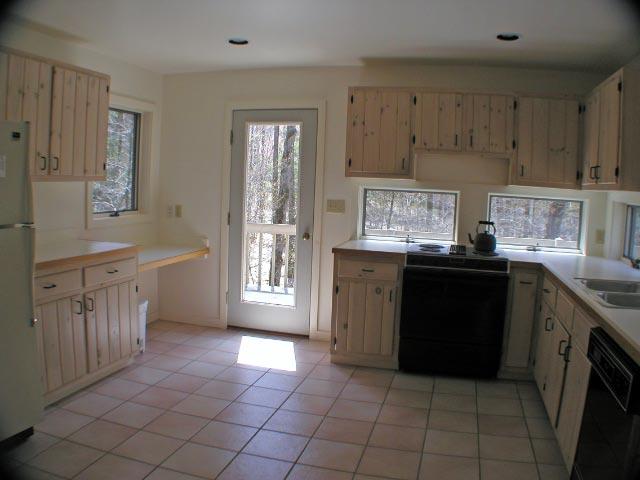 474 Norton Road Otis, MA 01029 - Photo 6 of 16 a kitchen with a sink and cabinets