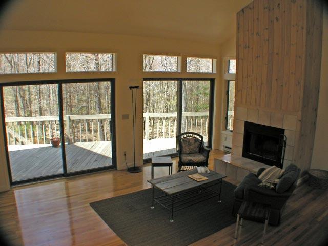 474 Norton Road Otis, MA 01029 - Photo 8 of 16 a living room with furniture and a flat screen tv