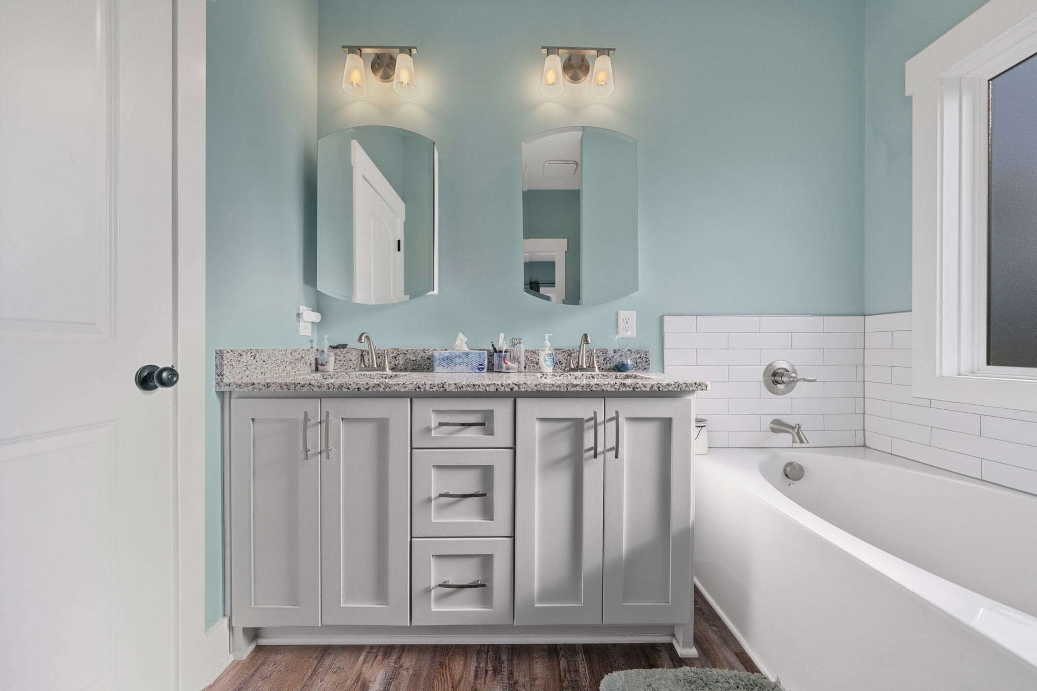 2086 Beverly Court Springfield, TN 37172 - Photo 19 of 39 a bathroom with a vanity a sink a mirror a bathtub and vanity