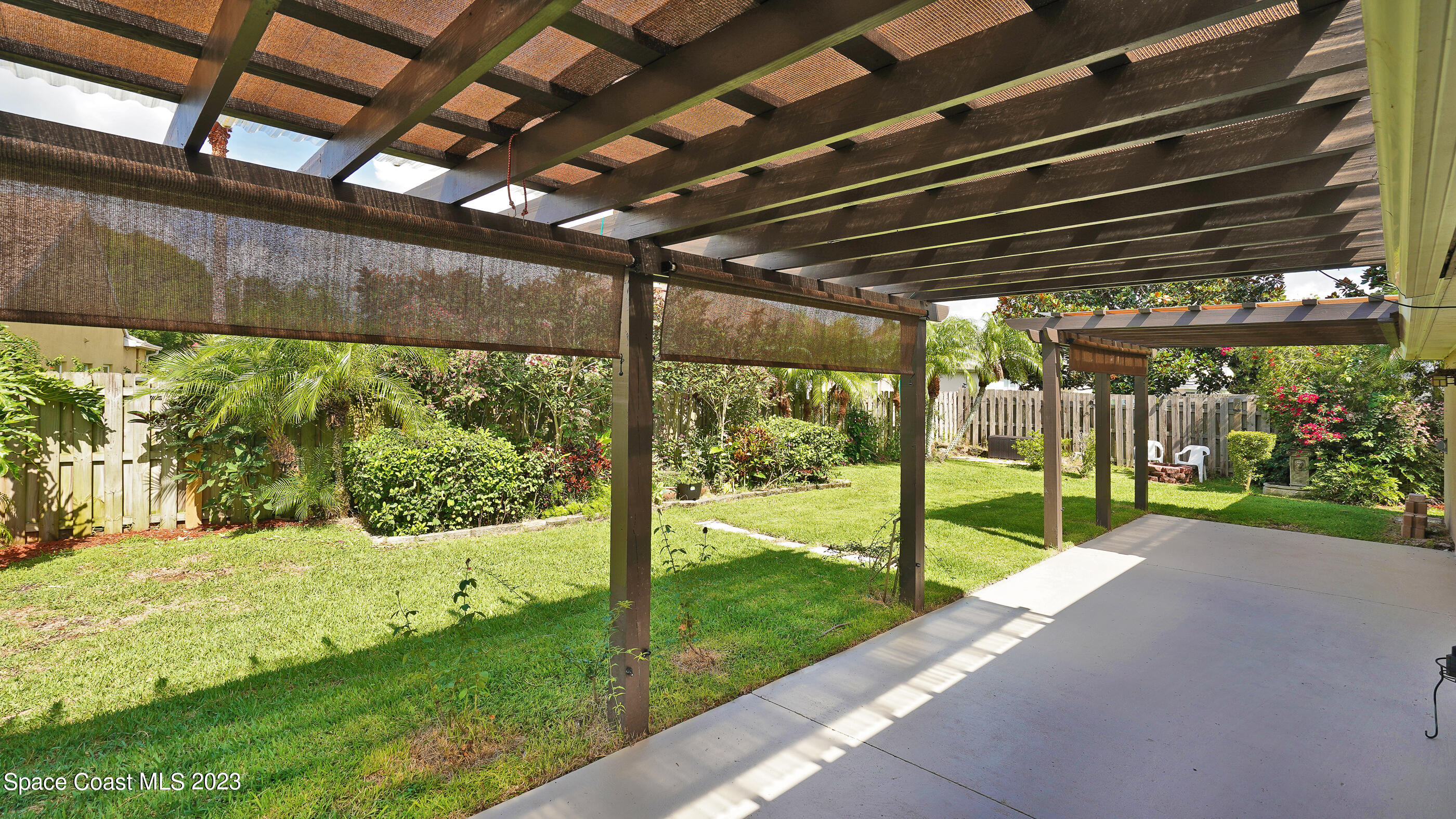 395 Brookcrest Circle Rockledge, FL 32955 - Photo 17 of 44 a view of a porch with a yard
