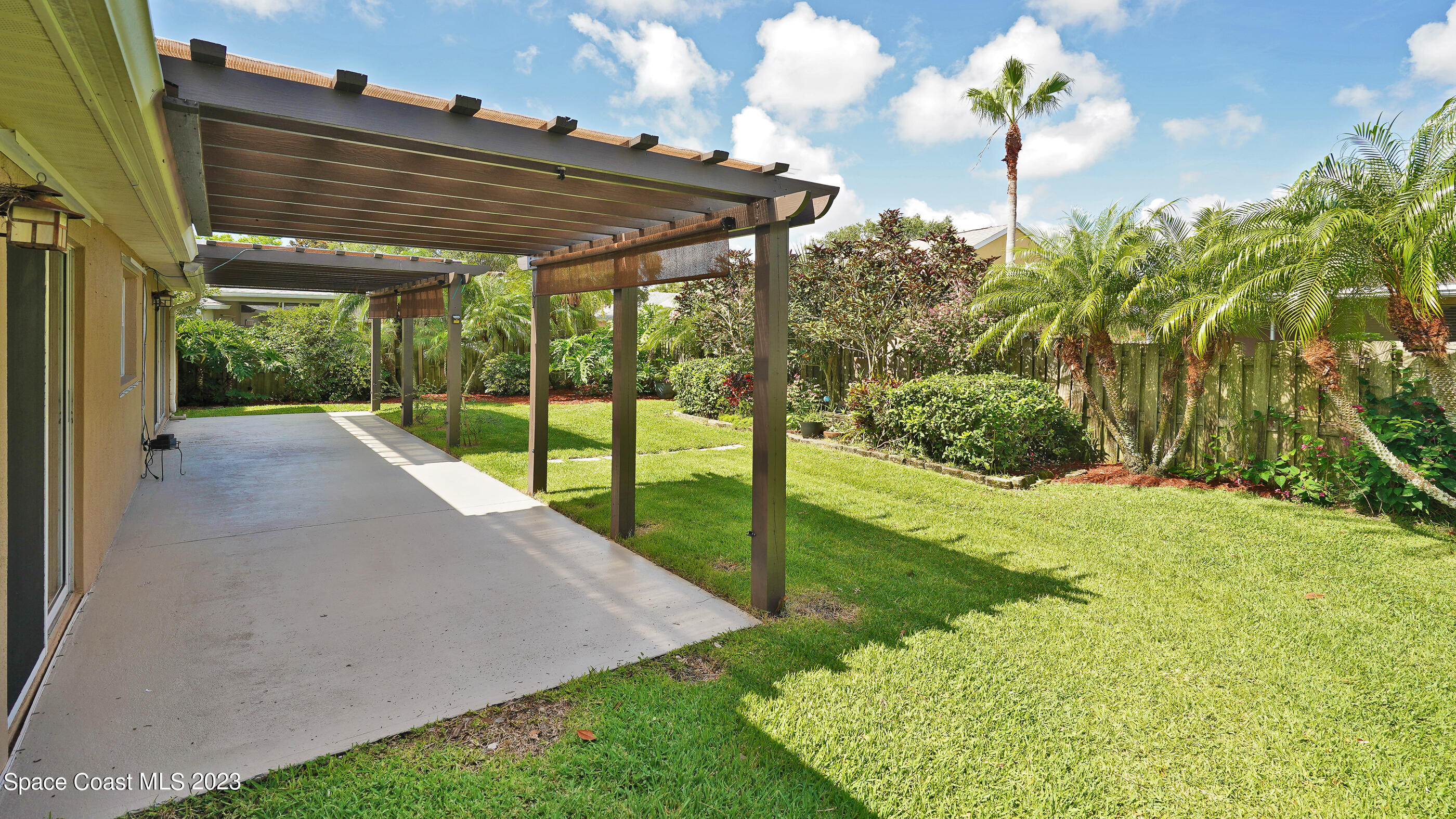 395 Brookcrest Circle Rockledge, FL 32955 - Photo 18 of 44 a view of a backyard