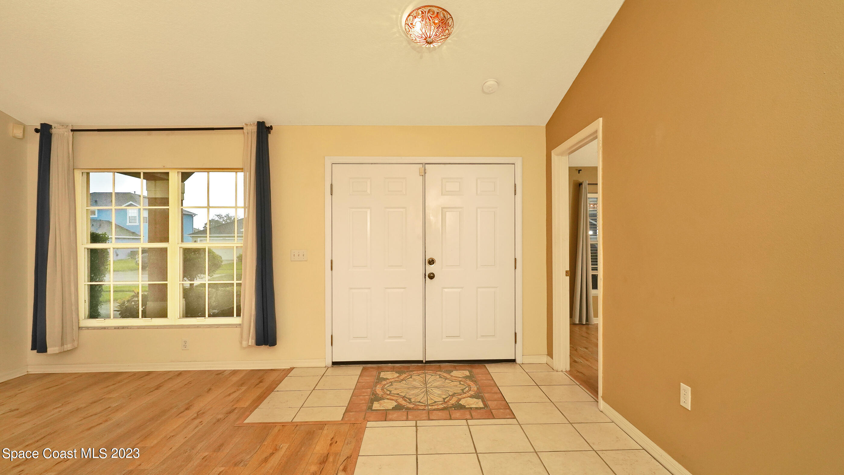 395 Brookcrest Circle Rockledge, FL 32955 - Photo 21 of 44 a view of an empty room with a window