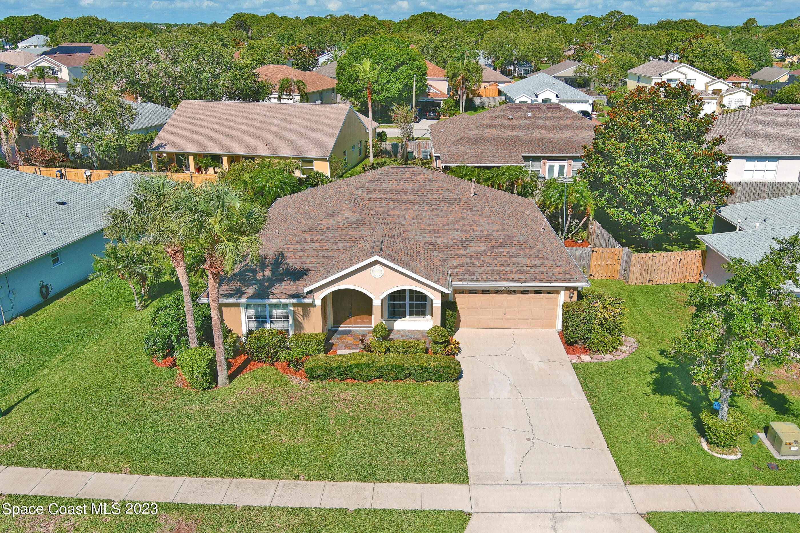 395 Brookcrest Circle Rockledge, FL 32955 - Photo 3 of 44 an aerial view of a house
