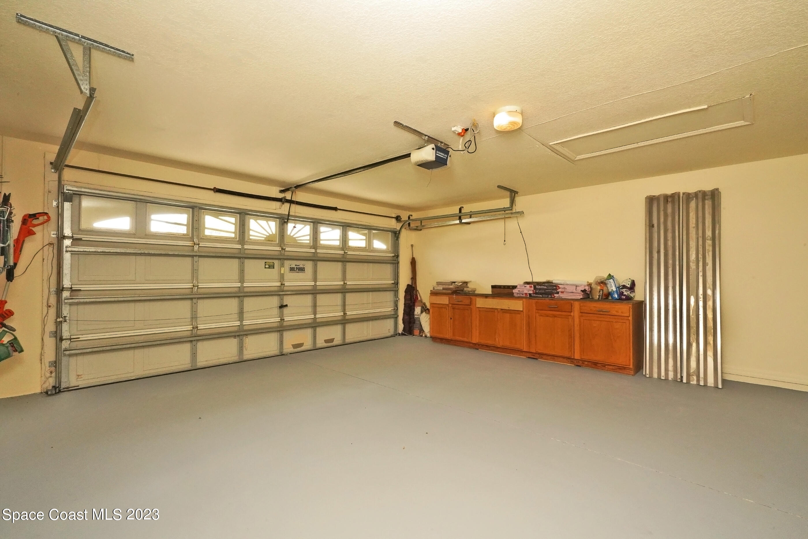 395 Brookcrest Circle Rockledge, FL 32955 - Photo 37 of 44 a view of a room with racks on the wall