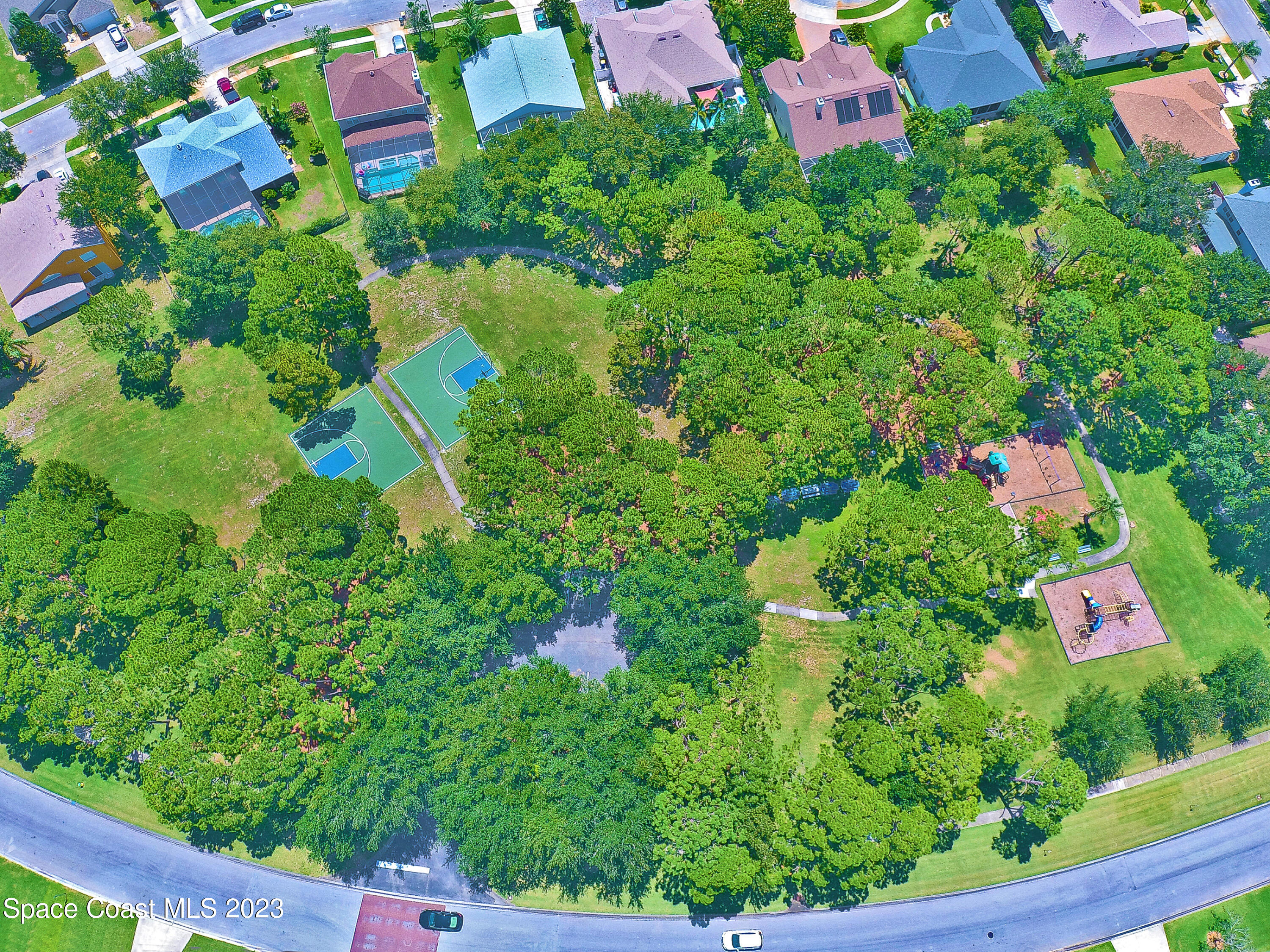 395 Brookcrest Circle Rockledge, FL 32955 - Photo 38 of 44 a view of a yard with plants