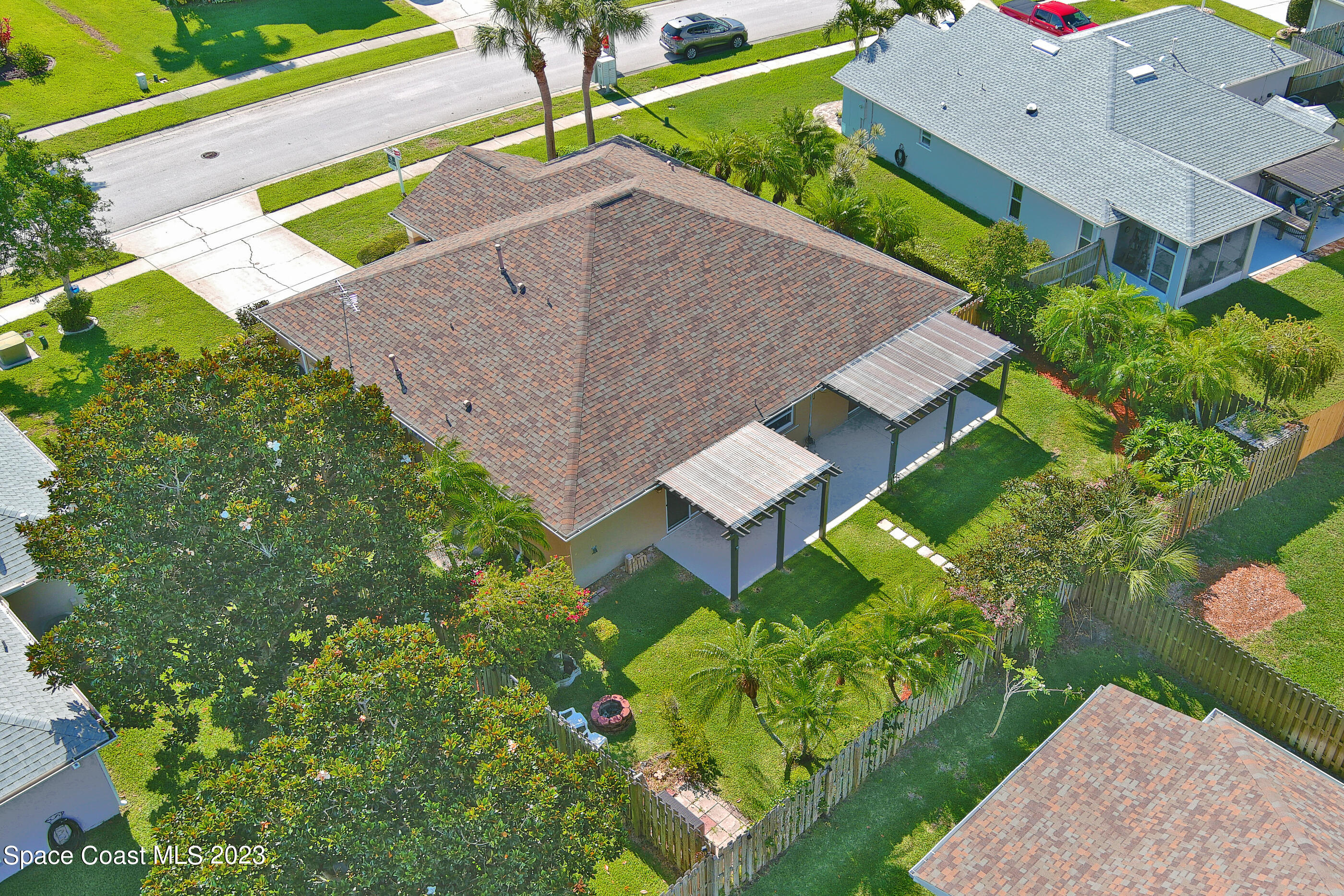 395 Brookcrest Circle Rockledge, FL 32955 - Photo 8 of 44 an aerial view of a house