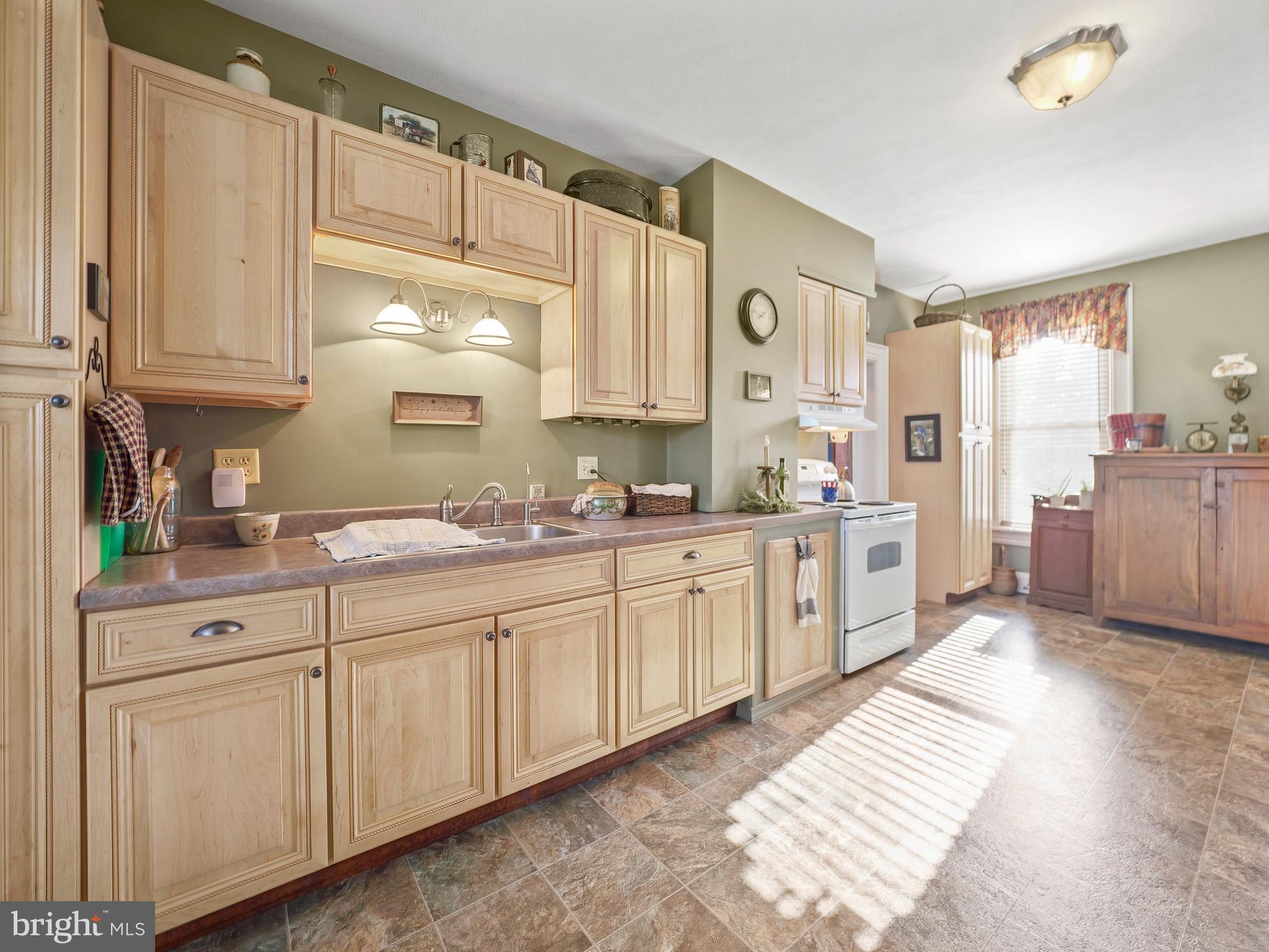 503 South Potomac Street Waynesboro, PA 17268 - Photo 11 of 36 a large kitchen with cabinets