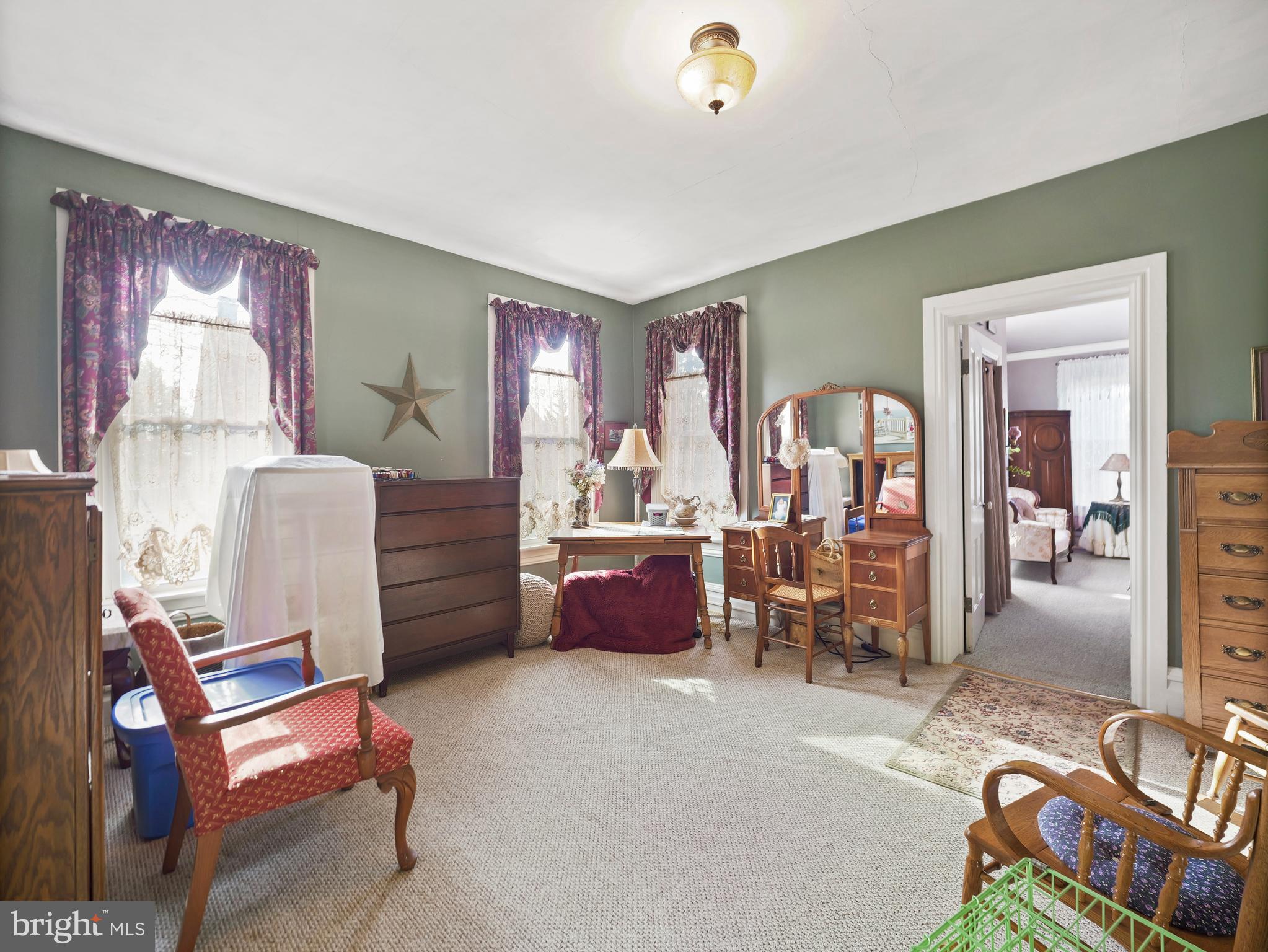 503 South Potomac Street Waynesboro, PA 17268 - Photo 20 of 36 a bedroom with furniture and a chair