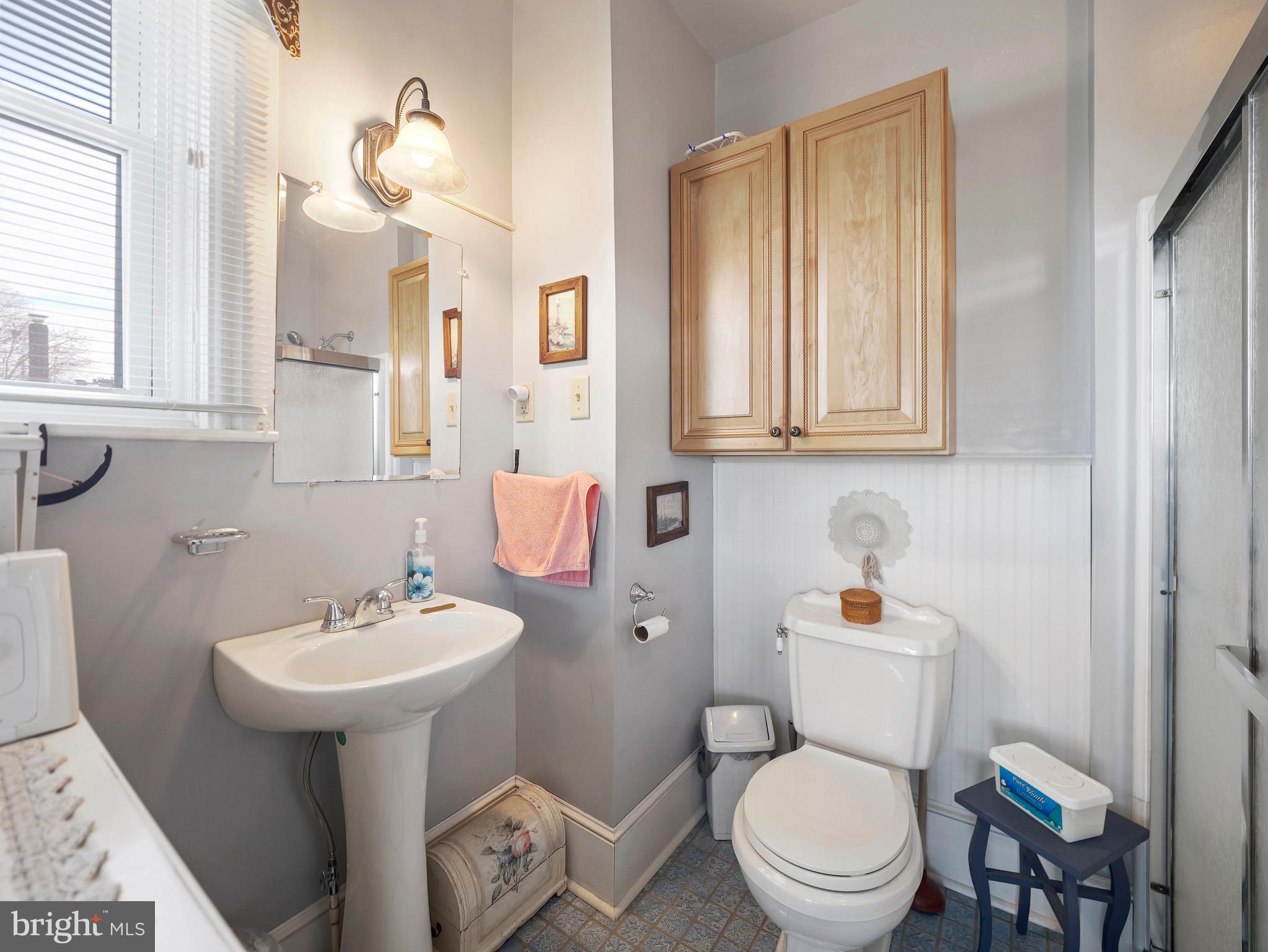 503 South Potomac Street Waynesboro, PA 17268 - Photo 24 of 36 a bathroom with a toilet sink and mirror