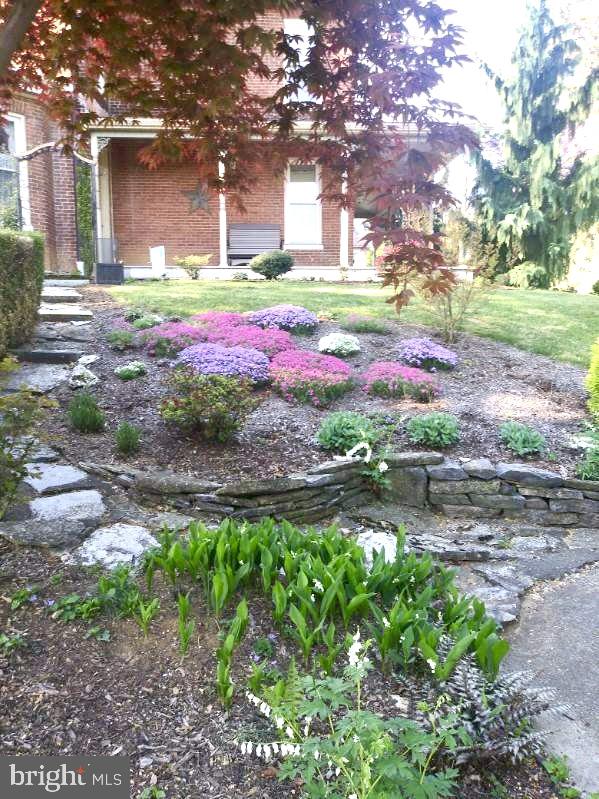 503 South Potomac Street Waynesboro, PA 17268 - Photo 35 of 36 a small garden covered with tall trees