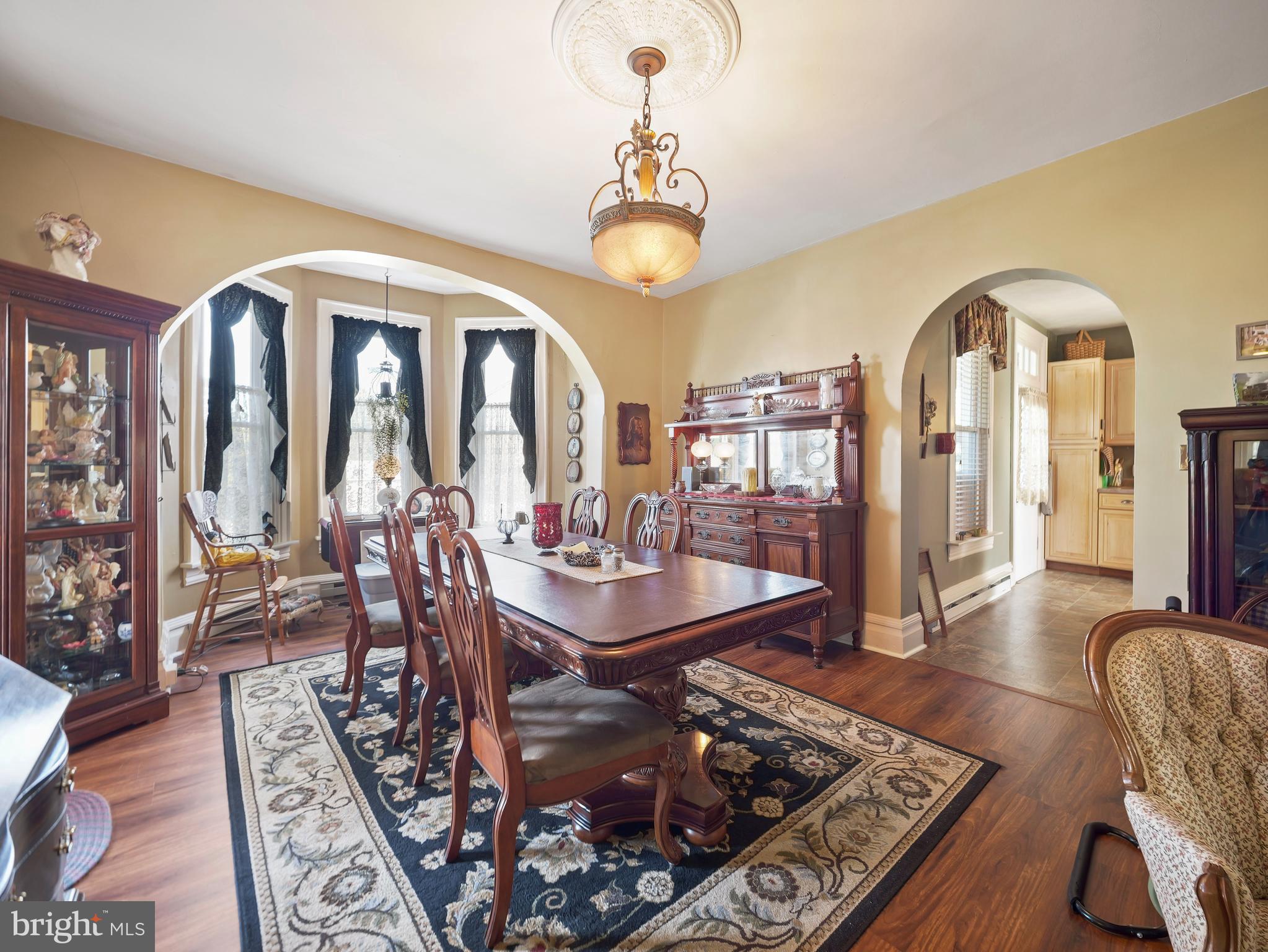 503 South Potomac Street Waynesboro, PA 17268 - Photo 9 of 36 a living room with furniture a chandelier and a rug