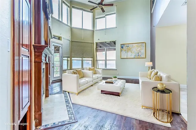 a bedroom with a bed and dresser with mirror