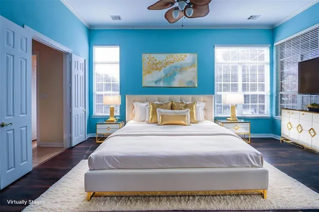 a bathroom with a tub sink shower and mirror