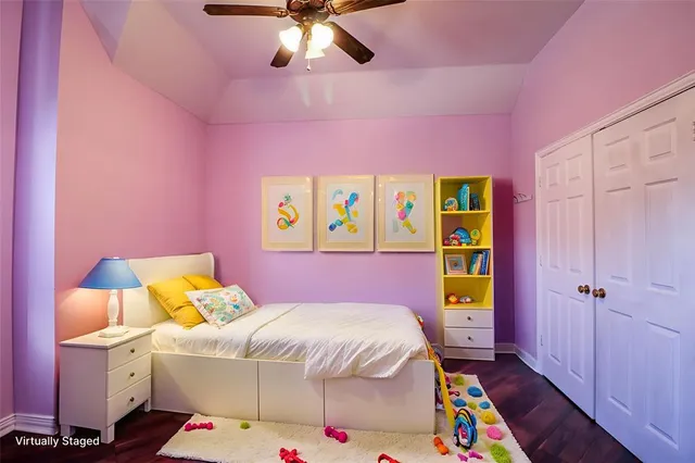 a view of a big house with a big yard and large tree