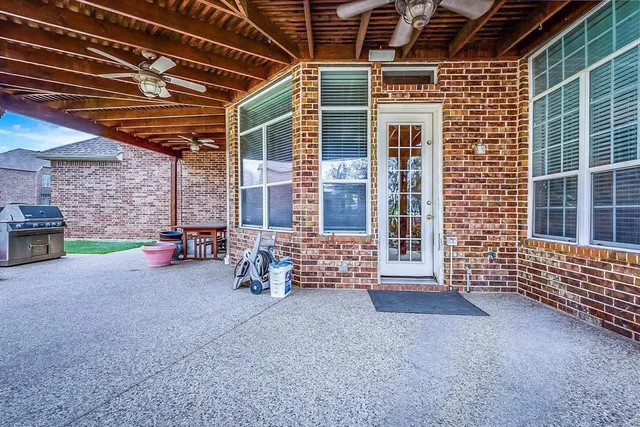 a view of a swimming pool with a yard