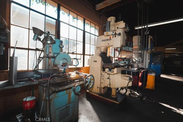 a kitchen with a stove and a table